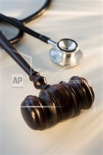 A gavel next to a stethoscope